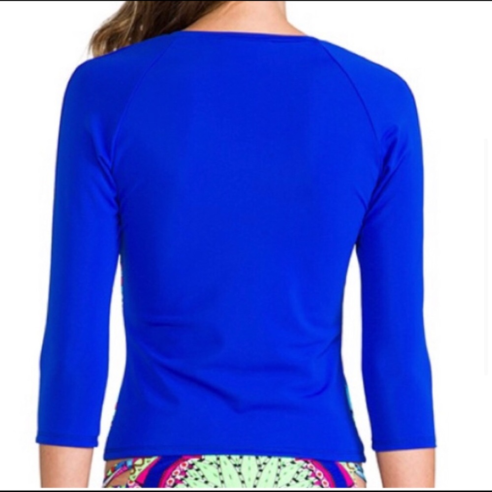 Mara Hoffman rash guard with pink ganesh against a pool blue background - Picture 3 of 14